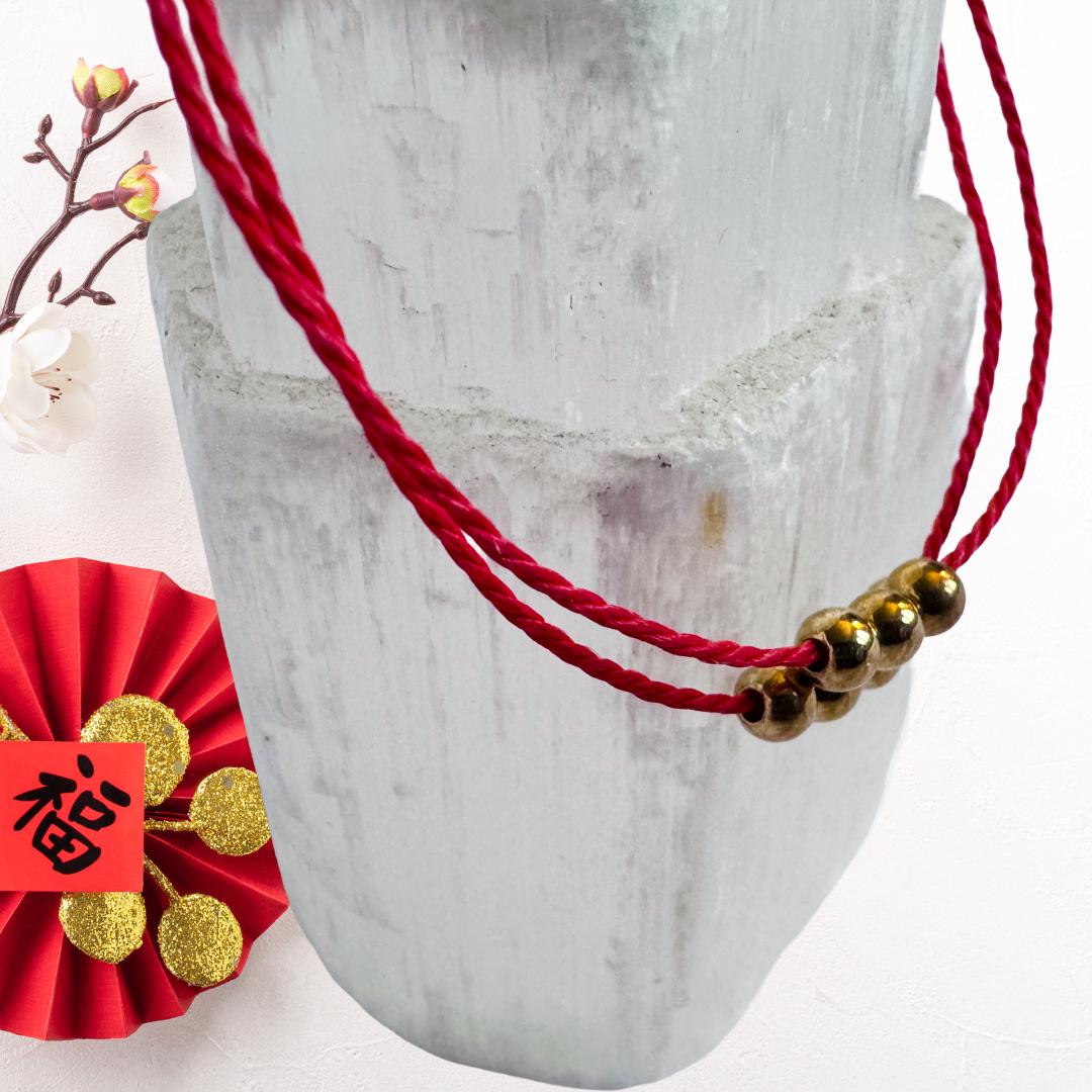 Lucky Charm Red Thread Bracelet | Seven Golden Beads of Fortune | Metta-Blessed™
